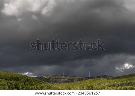 Storm clouds in the sky. Mountain landscape. Weather background. Selective focus