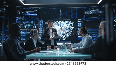Team of Software Development Engineers Having a Meeting in an Artificial Intelligence Research Center. Diverse Group of Professional Programmers Discussing Internet Opportunities for the AI Tool Royalty-Free Stock Photo #2348563973