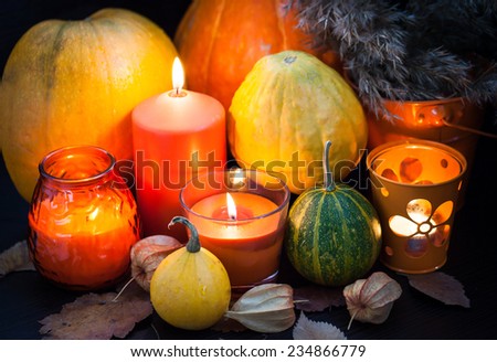 Decorative halloween pumpkins and candles 