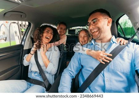 A happy family is excited about a family outing Royalty-Free Stock Photo #2348669443