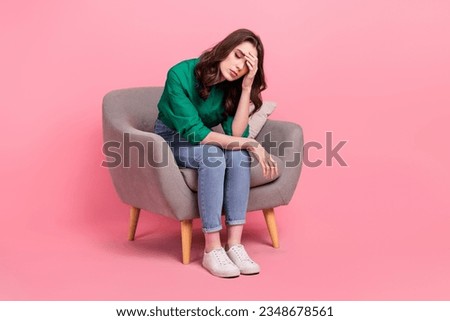Full length photo of unhappy tired lady wear green shirt sitting chair feeling exhasted isolated pink color background Royalty-Free Stock Photo #2348678561