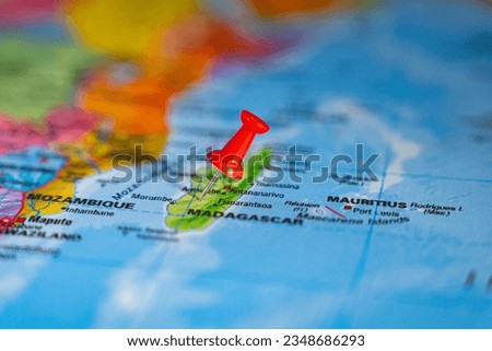 Map of Madagascar with a red pushpin stuck
