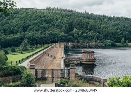Ladybower Reservoir Dam, large Y-shaped reservoir in the Upper Derwent Valley, at the heart of the Peak District National Park, Derbyshire, England, UK Royalty-Free Stock Photo #2348688449