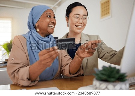 Online shopping, credit card and woman at customer service desk for banking and talking to a consultant. Muslim, asian and professional consulting a customer on rewards purchase on business website Royalty-Free Stock Photo #2348689877