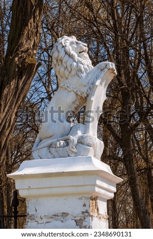 Lion statue near the gate in Kachanovka
