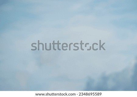 blue sky with white clouds blurred