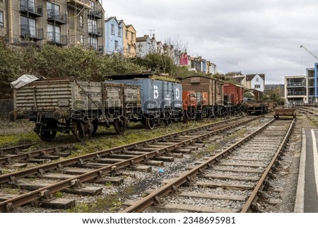 Old train wagons at Bristol harborside Royalty-Free Stock Photo #2348695981