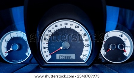 Car dashboard. Gauges Speedometer, tachometer, fuel level and engine temperature in the car