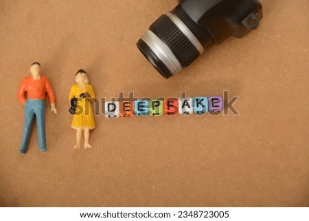 Miniature people and camera with text DEEPFAKE.A deepfake is a type of synthetic media that involves the use of artificial intelligence