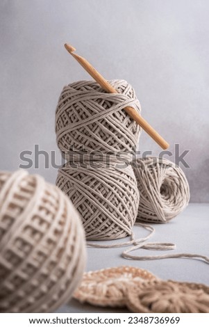 Skeins of cotton threads in pastel colors for crochet. Home craft concept.