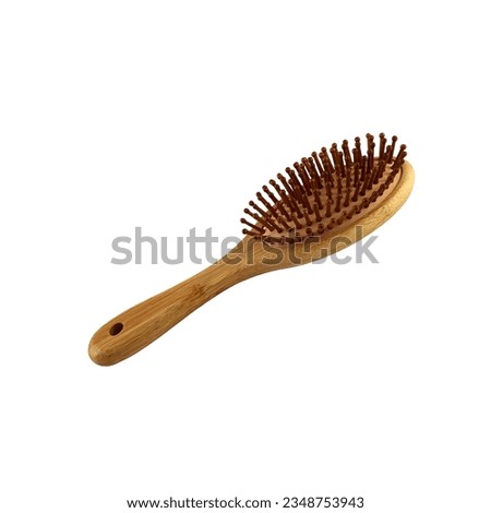 Wooden hairbrush isolated object bamboo material eco-friendly natural concept, personal woman beauty accessory, soft focus clipping path Royalty-Free Stock Photo #2348753943