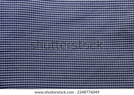 Fabric design background with small white and blue stripes, space for text