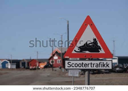 Warning sign, translation: scooter traffic, around Longyearbyen town. Spitsbergen, Svalbard, Norway