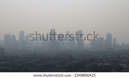 Panoramic view of Jakarta city air pollution Royalty-Free Stock Photo #2348800425