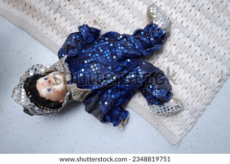 clown on floor, concept neglect through of lonely doll, potentially highlighting broader societal or personal issues, Imaginary, societal or personal issues Companionship Royalty-Free Stock Photo #2348819751