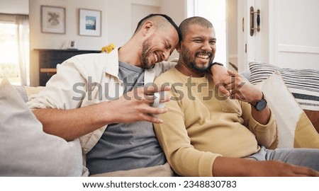 Laughing, relax and a gay couple on the sofa with coffee, conversation or love in a house. Happy, together and lgbt men on the living room couch for a funny story, communication or speaking with tea Royalty-Free Stock Photo #2348830783