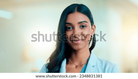Satisfied, confident entrepreneur doing an online training for a remote, distance job. Closeup face portrait of a successful business woman standing and smiling against a bokeh, copyspace background. Royalty-Free Stock Photo #2348831381