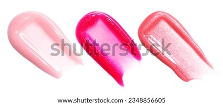 Selection of lip gloss textures isolated on white background. Smudged cosmetic product smear. Makup swatch product sample Royalty-Free Stock Photo #2348856605