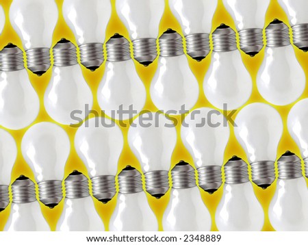 Composition of four rows of lamp bulbs over yellow background.