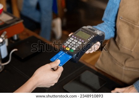 close-up. Customer hands are spending.
This store offers a cashless service. and digital currency
The credit limit on the card is sufficient to pay.
The credit limit on the card is insufficient. Royalty-Free Stock Photo #2348910893