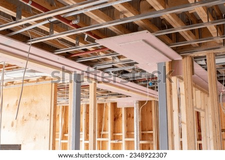 Timber frame apartment building construction Royalty-Free Stock Photo #2348922307