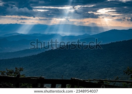 Ray of light through the clouds on the high mountain, beautiful scenery. Royalty-Free Stock Photo #2348954037
