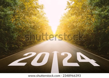 The new year 2024 or straightforward concept. Text 2024 written on the road in the middle of asphalt road at sunset. planning and challenge, business strategy, opportunity, hope, and new life.
 Royalty-Free Stock Photo #2348966393