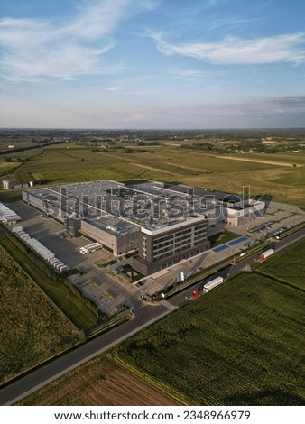 Aerial view of Modern Factory Building at New Industrial Park Green Field Investment.