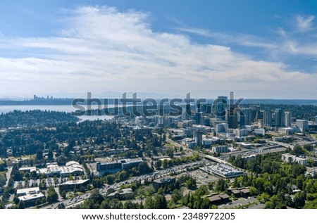 Aerial view of Bellevue, Washington with the Seattle skyline on the horizon