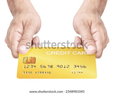 Hand holding mockup golden credit card isolated on white background with clipping path