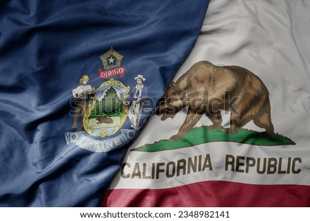 big waving colorful national flag of california state and flag of maine state . macro