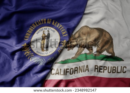 big waving colorful national flag of california state and flag of kentucky state . macro