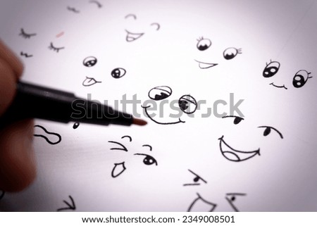 Creating a Smiley Face Drawing Using a Black Marker