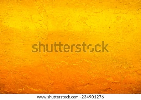 Yellow gold texture background on the back of buddha statue in temple