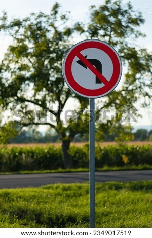 Traffic sign prohibiting left turns