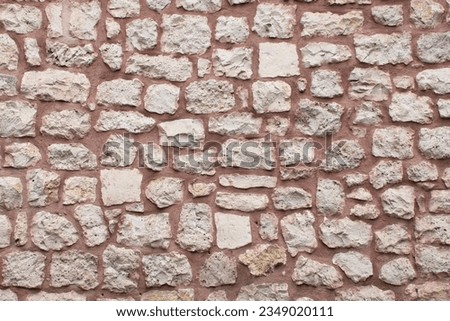 stone wall texture, photo taken with straight perspective, can be used as background