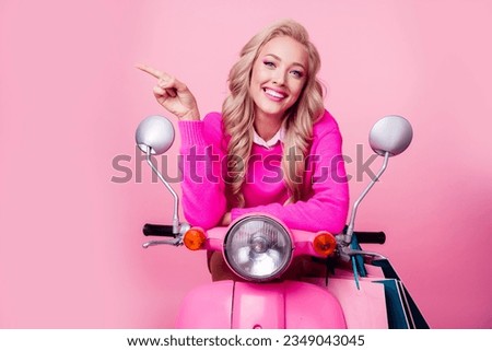 Photo of adorable satisfied lady sit moped dressed stylish clothes recommend offer empty space isolated on pink color background Royalty-Free Stock Photo #2349043045