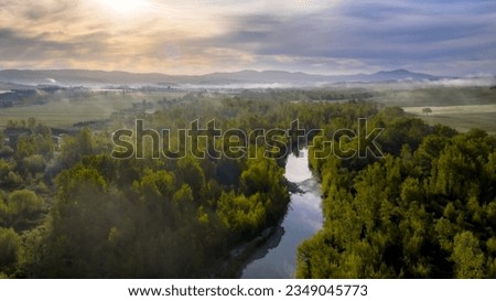 Aerial view of the Orcia river  in the Val d'Orcia in Tuscany, Italy, April. Royalty-Free Stock Photo #2349045773