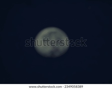 Defocused photo of the moon in the morning