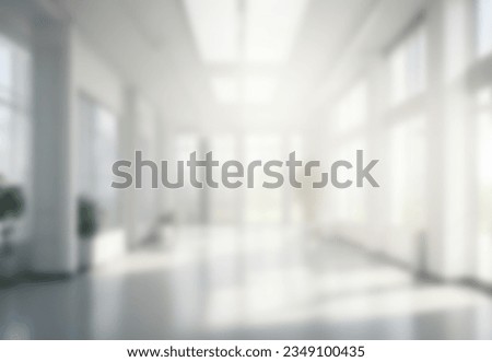 Light blurred background. The hall of an office or medical institution with panoramic windows and a perspective. Royalty-Free Stock Photo #2349100435