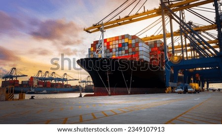 Crane loading Cargo Container export container ship in the international terminal logistics sea port concept freight shipping by ship, Truck running in port under the Big Crane transport trade Royalty-Free Stock Photo #2349107913