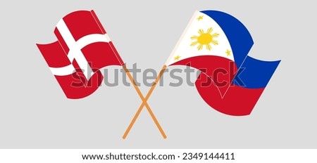 Crossed and waving flags of Denmark and the Philippines. Vector illustration

