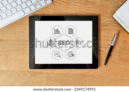 SEO, Search Engine Optimization ranking concept, magnifying glass, the idea of promote traffic to website