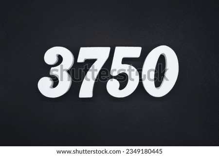 Black for the background. The number 3750 is made of white painted wood.