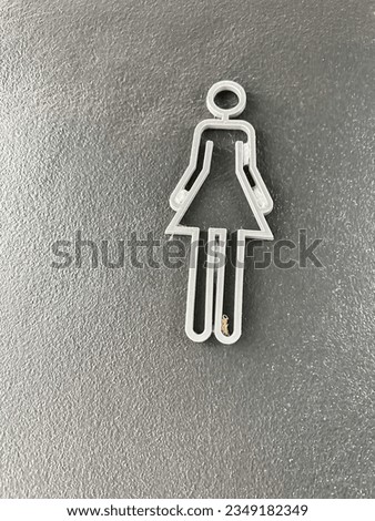 Symbolic image of a woman wearing a white skirt Attached on the wall, gray and black, loft style, beautiful