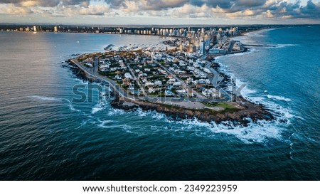 aerial of Punta del Este city Uruguay Atlantic coastline with scenic skyscraper building and skyline drone golden hours Royalty-Free Stock Photo #2349223959