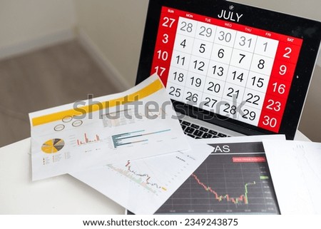 Tax payment day of 2021, in April, a calendar with balance documents.
