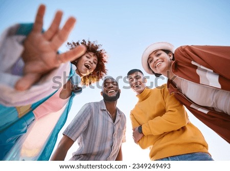 Portrait, smile and a group of friends on a blue sky outdoor together for freedom, bonding or fun from below. Diversity, travel or summer with happy men and women laughing outside on vacation Royalty-Free Stock Photo #2349249493