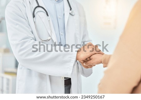 Doctor, patient and helping hand, empathy and communication, comfort and cancer results with kindness. Respect, help and trust, support in healthcare and people in hospital, holding hands and care Royalty-Free Stock Photo #2349250167