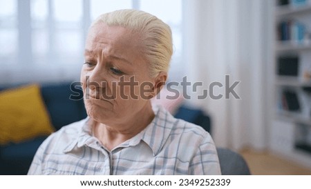 Lonely unhealthy woman missing her family, spending time in a nursing home